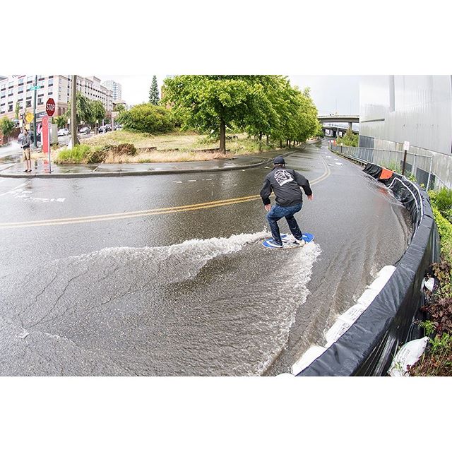 Instabanger: When it floods just go skimboarding. @equalmotion taken advantage of a big rainstorm in the Pacific Northwest.
